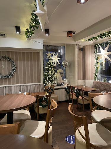 Café Kladdkakan - Gastronomi och hotellverksamhet