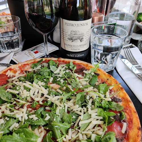 Trattoria La Pizza - Gastronomi och hotellverksamhet