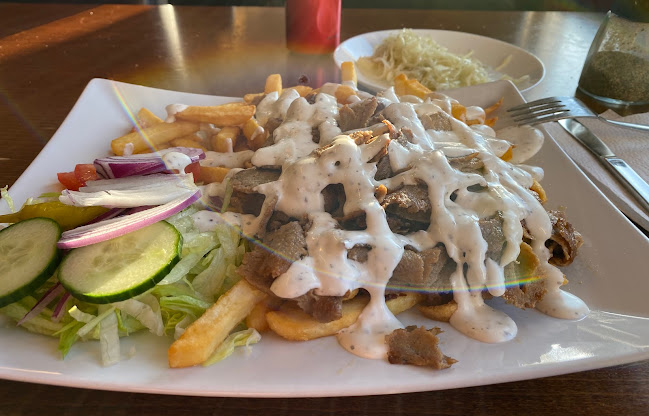 Nya Kreta Pizzeria - Gastronomi och hotellverksamhet