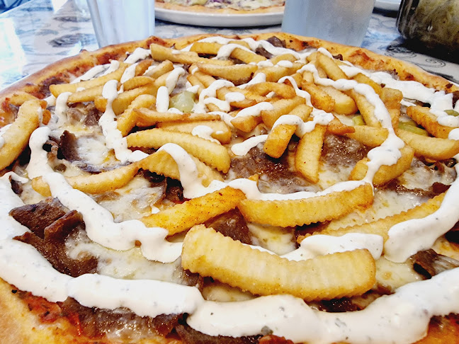 Mozzarella Pizzeria - Gastronomi och hotellverksamhet