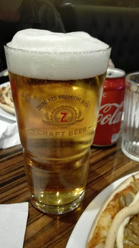 Grand Pizza - Gastronomi och hotellverksamhet