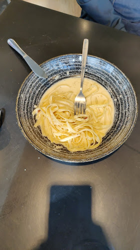 Trattoria Milano - Gastronomi och hotellverksamhet