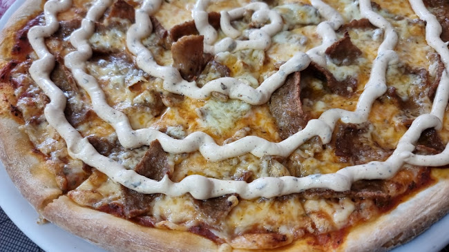 Amigo pizzeria - Gastronomi och hotellverksamhet