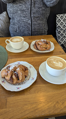Café La Vache - Gastronomi och hotellverksamhet