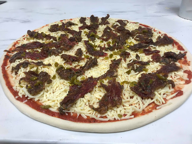 Pizzeria Amore (i Västerås) - Gastronomi och hotellverksamhet