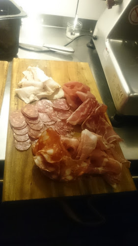 Enoteca Sassi - Gastronomi och hotellverksamhet