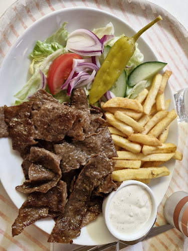 Matgladaoxen - Gastronomi och hotellverksamhet