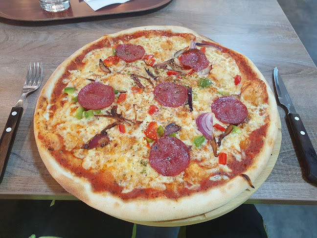 Sinbad pizzeria & kolgrill - Gastronomi och hotellverksamhet