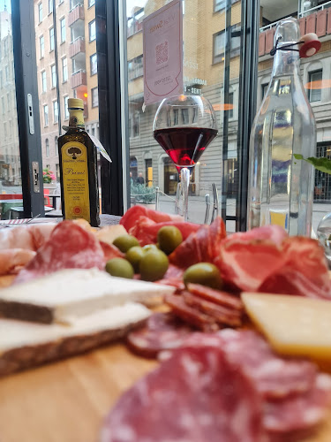 Enoteca Sassi - Gastronomi och hotellverksamhet