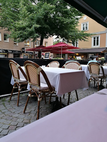 Brasserie Le Coq Rouge - Gastronomi och hotellverksamhet