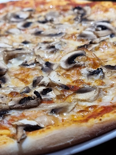 Pizzeria Papillon - Gastronomi och hotellverksamhet