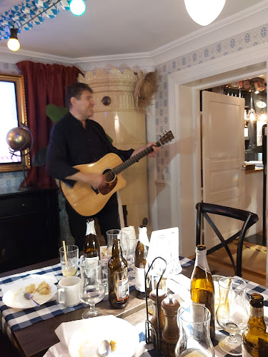 Gästgivaregården - Gastronomi och hotellverksamhet