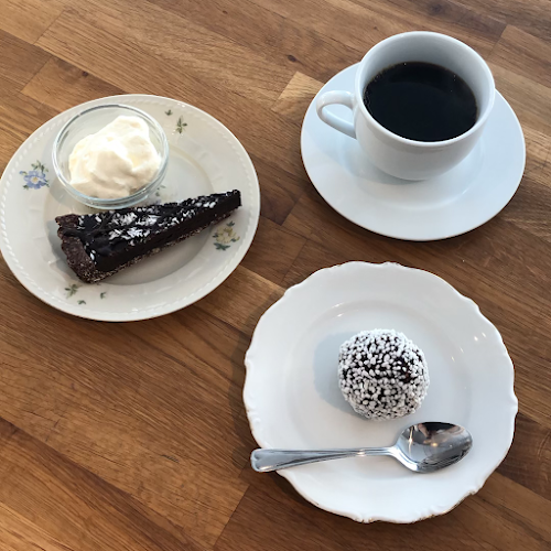 Café La Vache - Gastronomi och hotellverksamhet