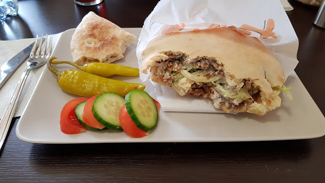 Estelle Pizzeria - Gastronomi och hotellverksamhet