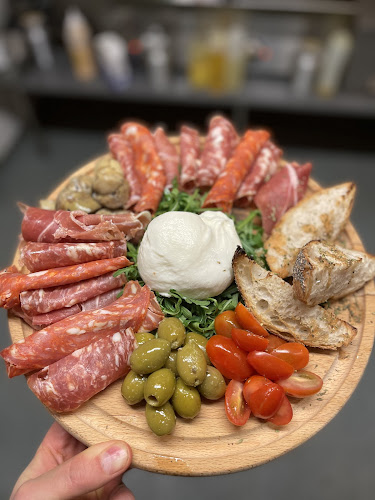 Comentarii opinii despre Grande Italiensk Restaurang & BAR Eslöv / VED PIZZA