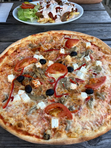 Opinii despre Vårbergsgrillen în Skärholmen - Gastronomi och hotellverksamhet