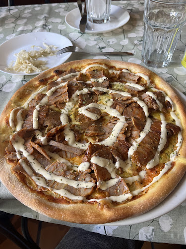 Frigga Pizzeria - Gastronomi och hotellverksamhet