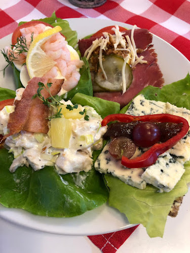 Den Lille Danske - Gastronomi och hotellverksamhet