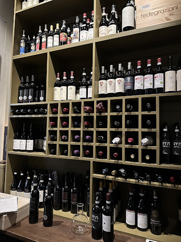 Enoteca Sassi - Gastronomi och hotellverksamhet