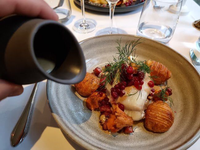 Brasserie Le Coq Rouge - Gastronomi och hotellverksamhet