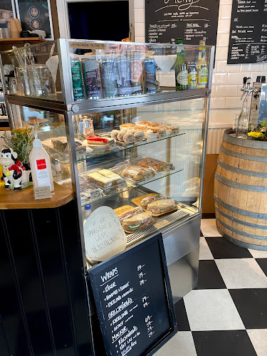 Café La Vache - Gastronomi och hotellverksamhet