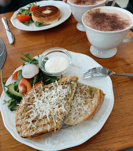 Café La Vache - Gastronomi och hotellverksamhet