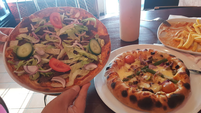 Opinii despre Cavalini Pizzeria în Halmstad - Gastronomi och hotellverksamhet