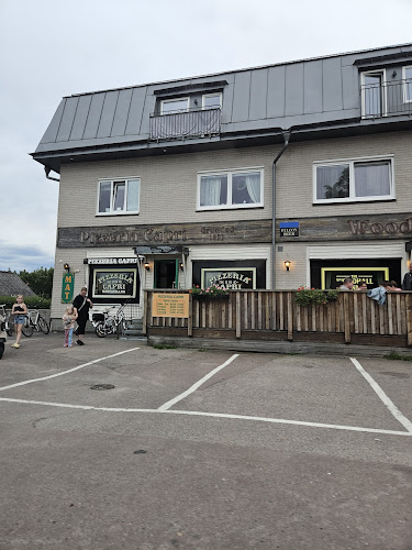 Capri Pizzeria - Gastronomi och hotellverksamhet