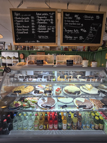 Kafé Kuriosa - Gastronomi och hotellverksamhet