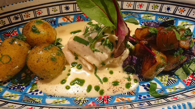 Restaurant L'Oasis - Gastronomi och hotellverksamhet