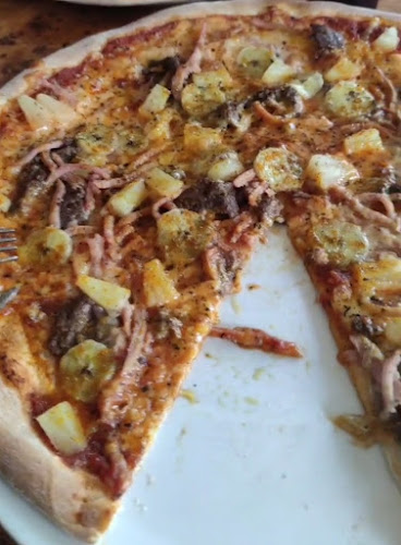 Pizzabutik Vesuvio - Gastronomi och hotellverksamhet