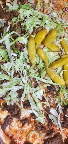 Dotteviks pizzeria - Gastronomi och hotellverksamhet