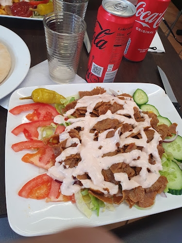 Bella Pizzeria - Gastronomi och hotellverksamhet