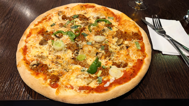 Restaurang Pizzeria Capri i Kisa - Gastronomi och hotellverksamhet