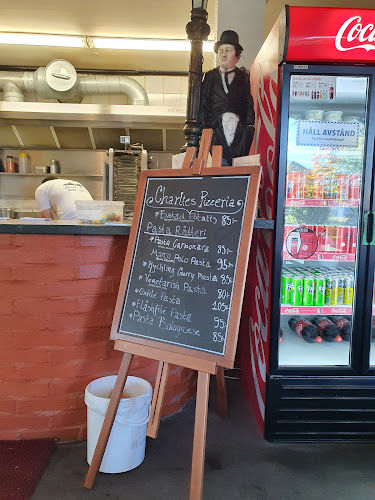 Charlies Pizzeria - Gastronomi och hotellverksamhet