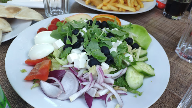 Charlies Pizzeria - Gastronomi och hotellverksamhet