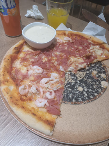 Pizzeria Rendez Vouz - Gastronomi och hotellverksamhet