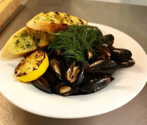 Brasserie Le Coq Rouge - Gastronomi och hotellverksamhet