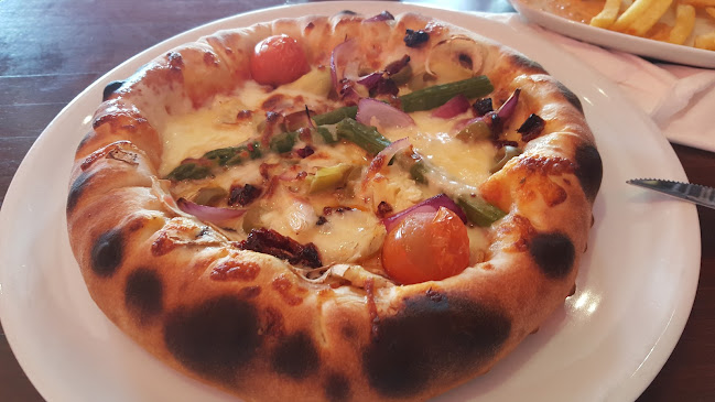 Cavalini Pizzeria - Gastronomi och hotellverksamhet