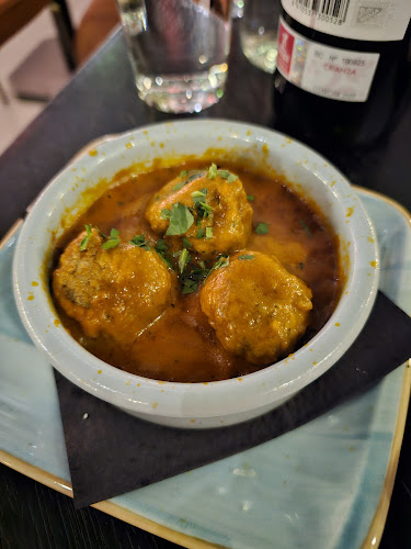 Caliente Tapasbar City - Gastronomi och hotellverksamhet